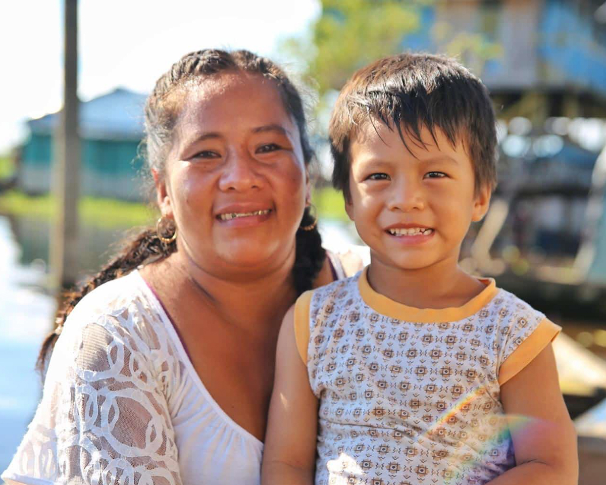 big-dreams-nadia-son Nadia smiles with her son Pedro, happy that she remembered to dream big dreams thanks to an OBI community health worker program.