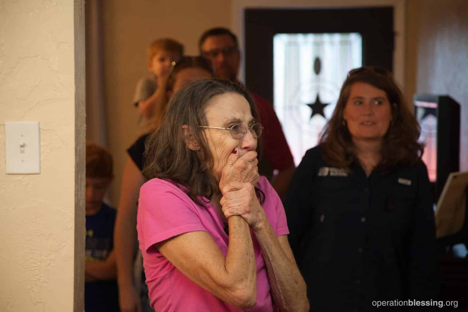 rebuilding-life-priscilla Priscilla is overcome by emotion as she sees her new home. Operation Blessing helped in rebuilding her life.