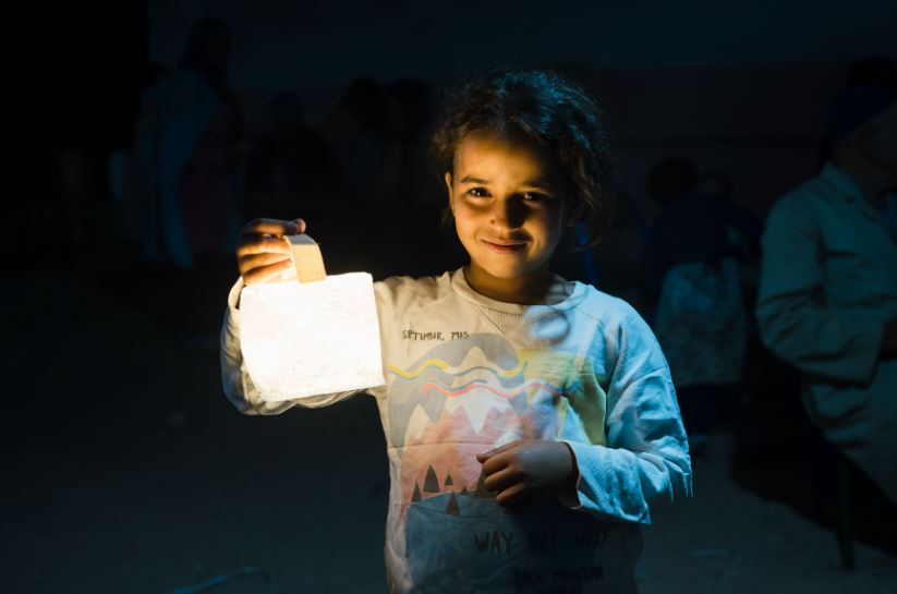 morocco-earthquake-aid-solar-light-girl