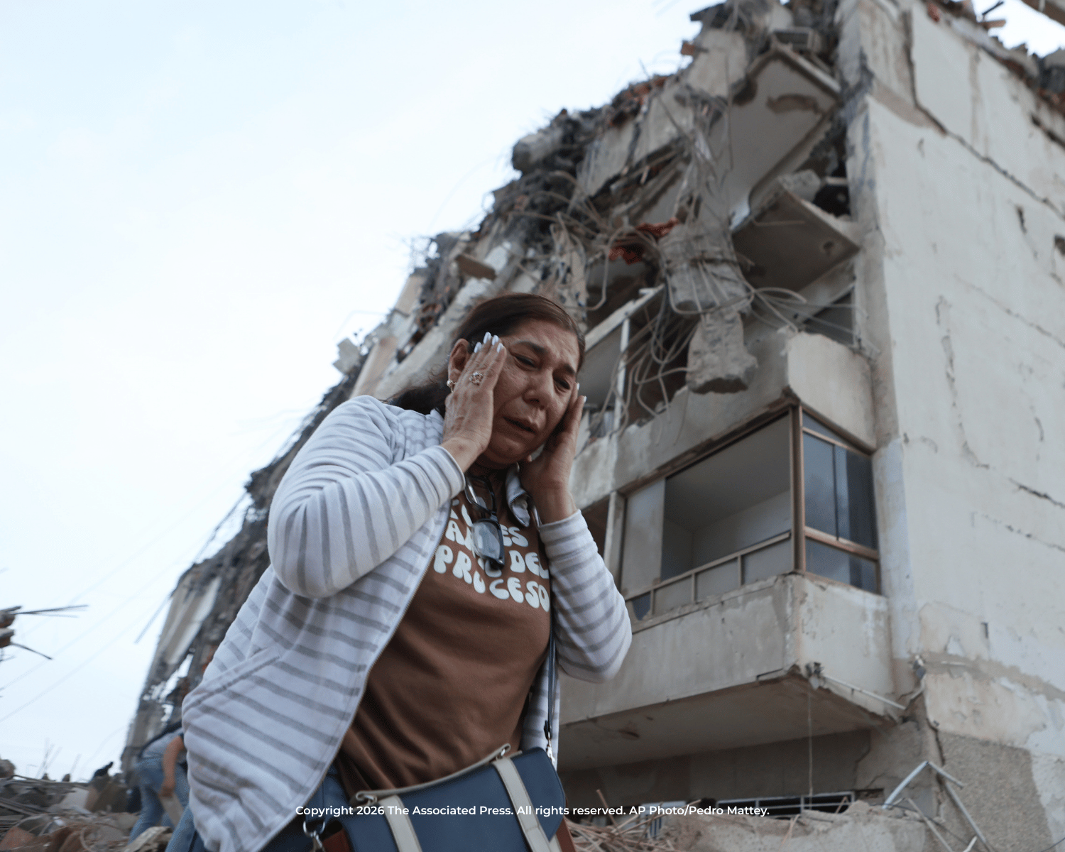 Woman crying among Venezuela earthquake debris